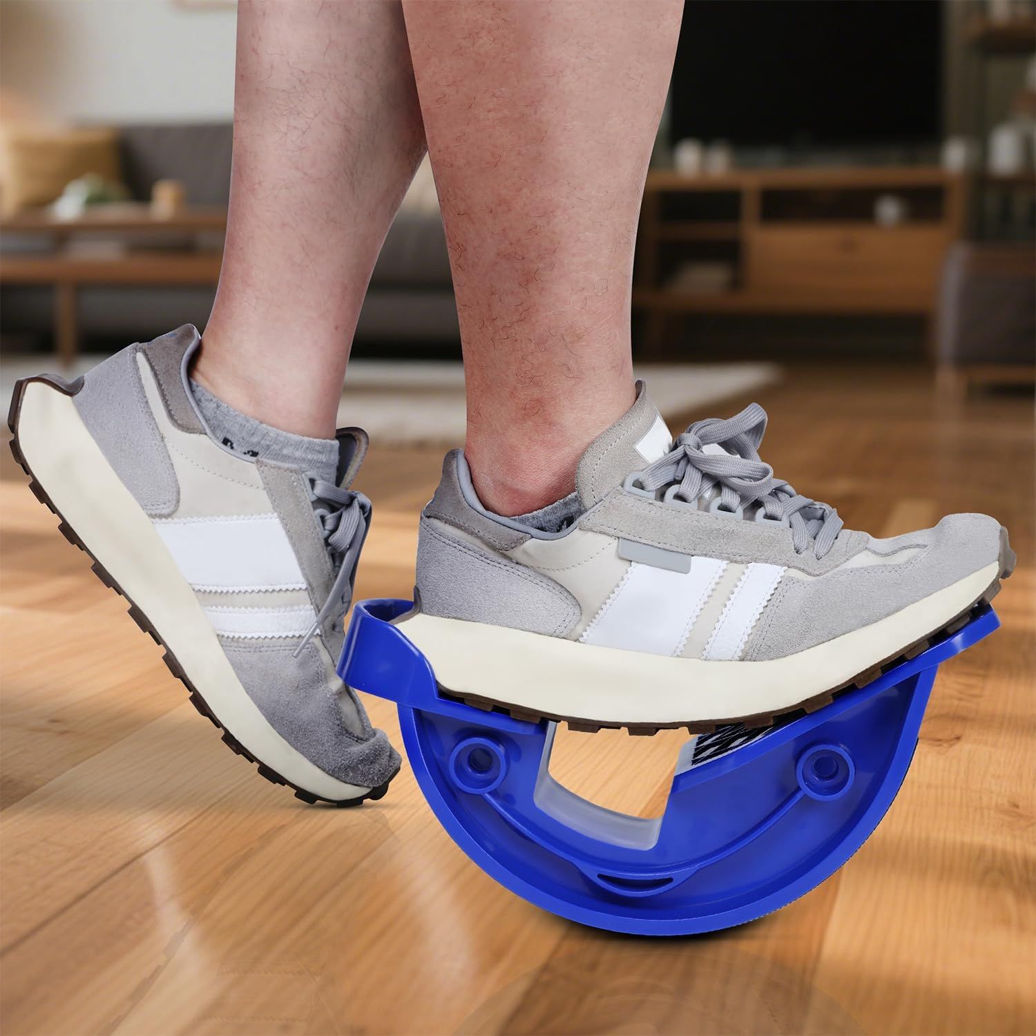 Demonstrates the product being used in a real-world home setting to show shoppers how the balance board fits naturally into everyday fitness routines.