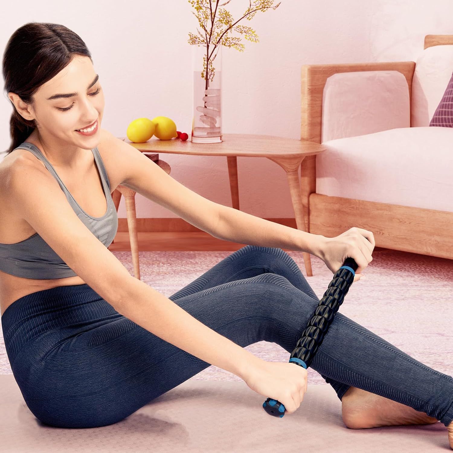 Demonstrates the product being used in a real-world home setting to help shoppers visualize how they would use the massage roller in their own daily routine.