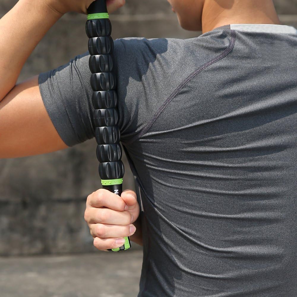 Demonstrates the product being used in a real-world fitness setting to help shoppers visualize how they would use the massage roller stick during their own workouts or recovery routines.
