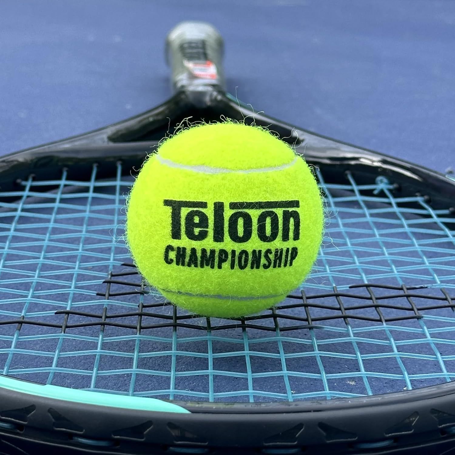 Showcases the product in a real-world tennis environment to help shoppers visualize the ball in action and connect with the sport context.