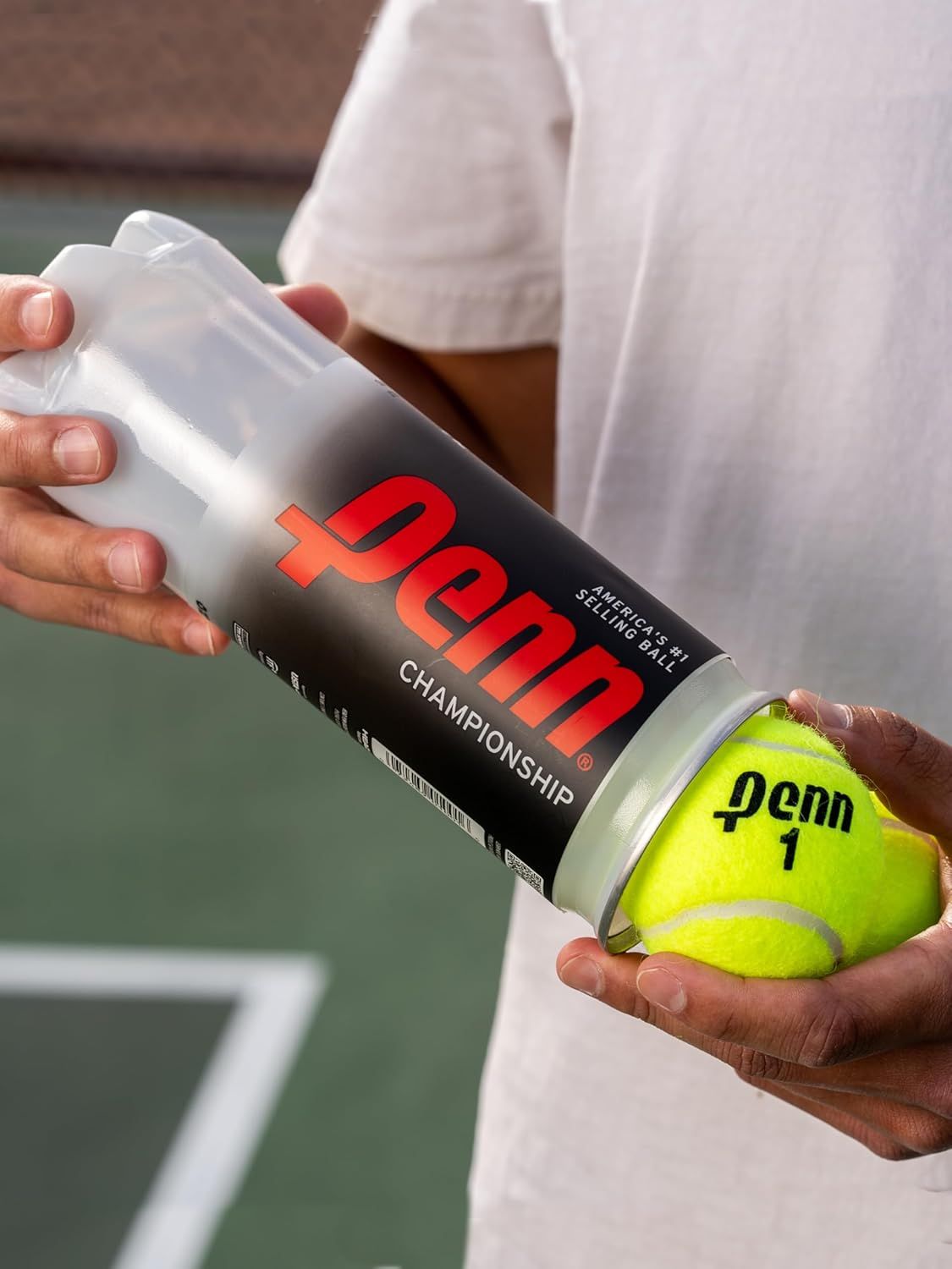 Shows the product being used in a real-world tennis environment to help shoppers visualize the product in action and connect with the sport context.