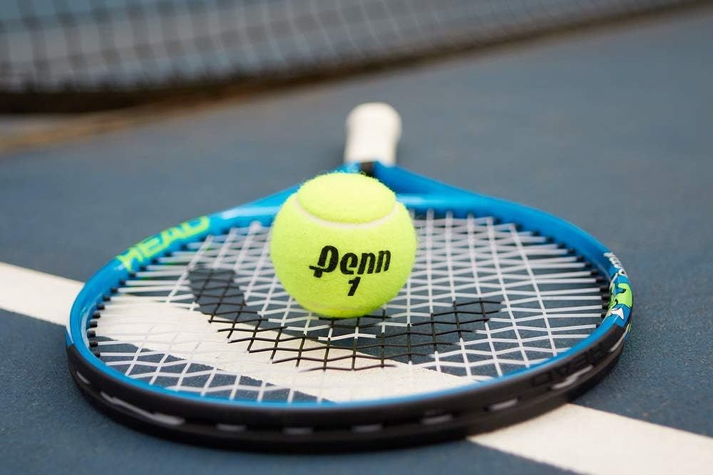 Shows the product in its natural real-world environment on a tennis court to help shoppers visualize the product in use and create an emotional connection with the sport.