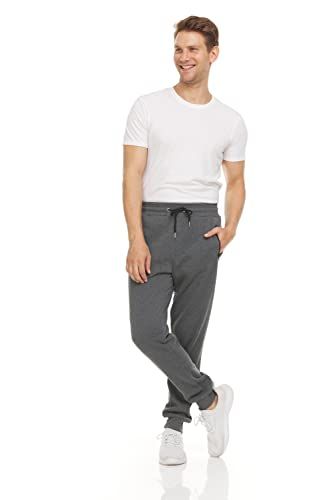 Shows the product (gray jogger pants) worn by a model on a clean white background to give shoppers a clear view of fit, style, and appearance.