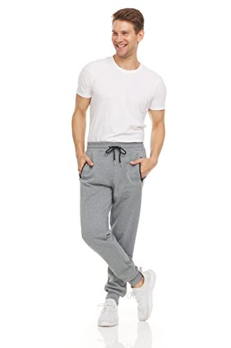 Shows the complete product (joggers and t-shirt) on a model in a clean, catalog-style presentation to help shoppers visualize fit and appearance.
