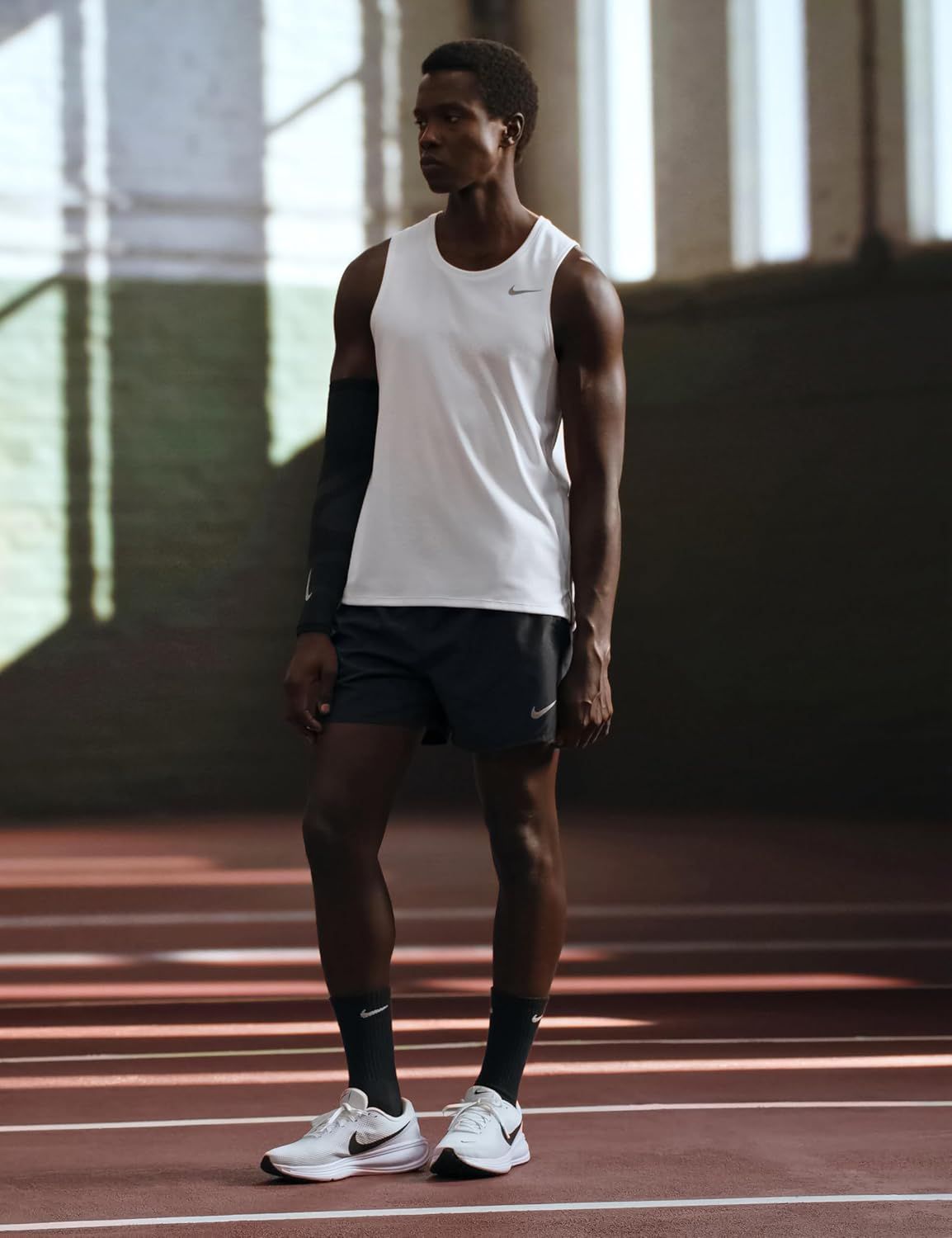 Showcases the product in an authentic athletic environment to help shoppers visualize themselves using Nike apparel during training or competition.