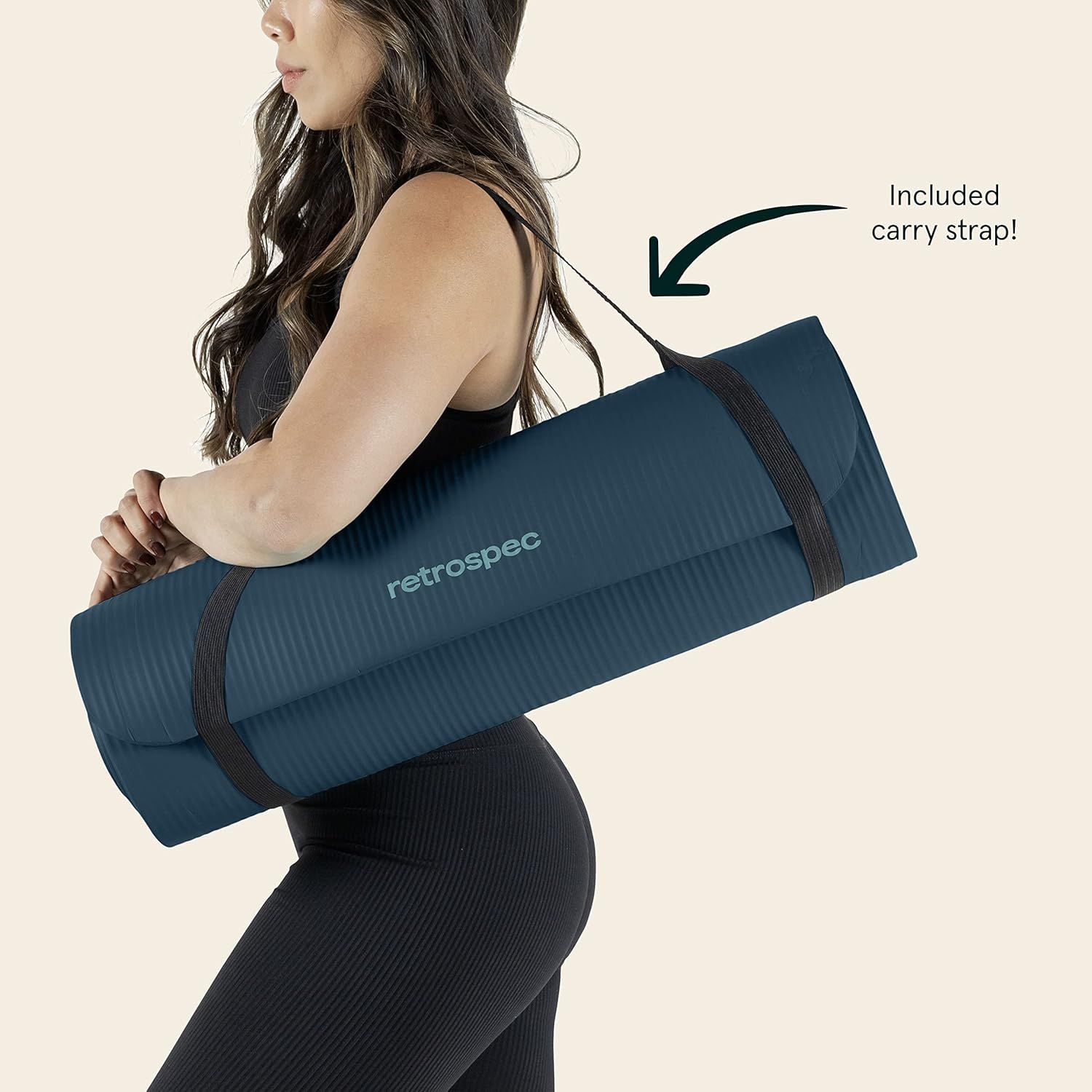 Highlights that the yoga mat comes with an included carry strap, reassuring shoppers about portability and convenience. Demonstrates the product's portability and ease of transport with the included…