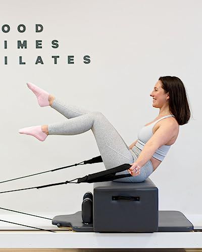 Shows the product being actively used in a real-world Pilates workout setting to help shoppers visualize how the equipment functions during exercise.