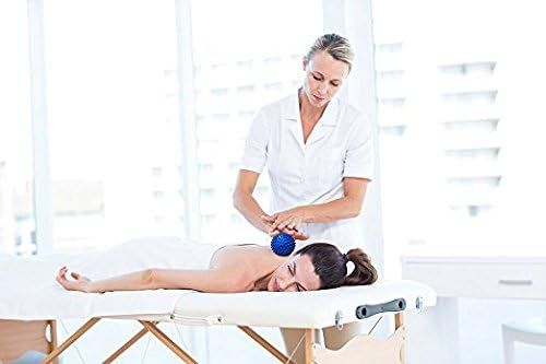 Shows the product being used in a real-world professional massage or spa setting to help shoppers visualize its practical application and build confidence in its effectiveness.