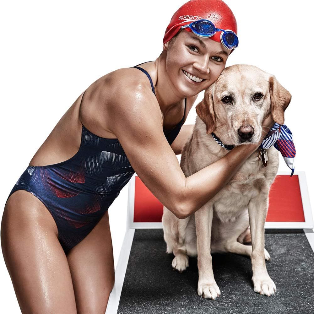 Creates an emotional connection by showing the product (swim cap and goggles) in a warm, relatable lifestyle context with a swimmer and their pet, building brand affinity and humanizing the product.