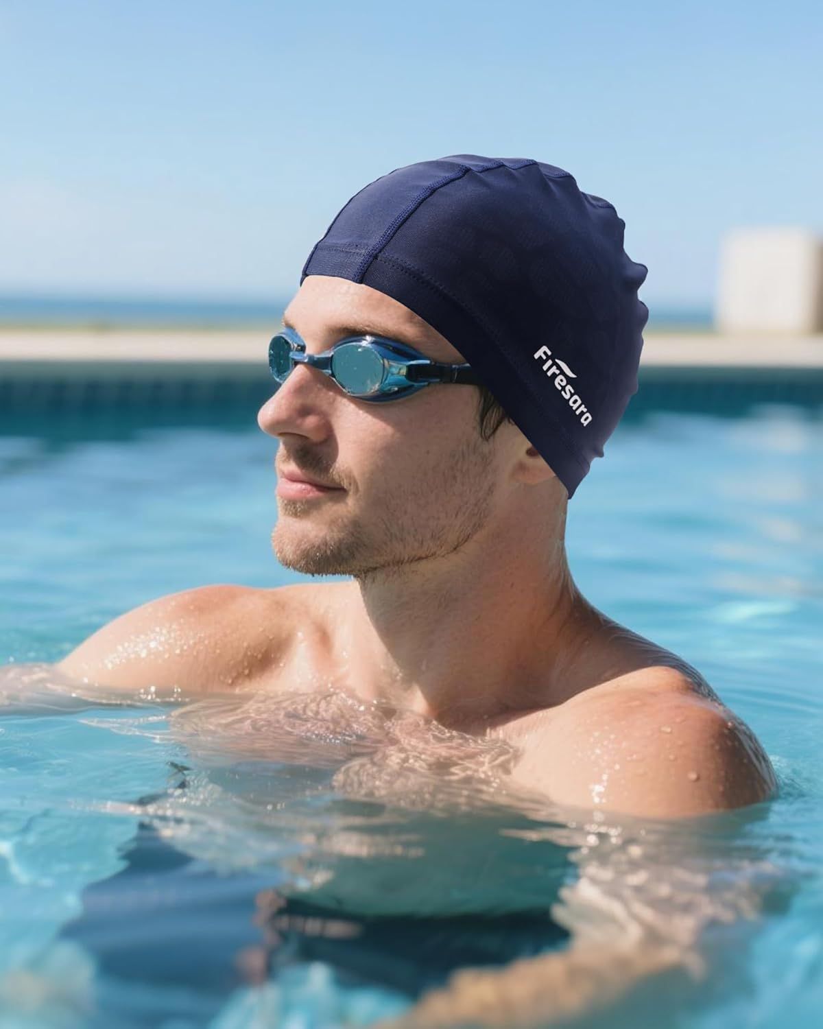 Demonstrates the product (swim cap and goggles) being used in a real-world swimming environment to help shoppers visualize themselves using the product.