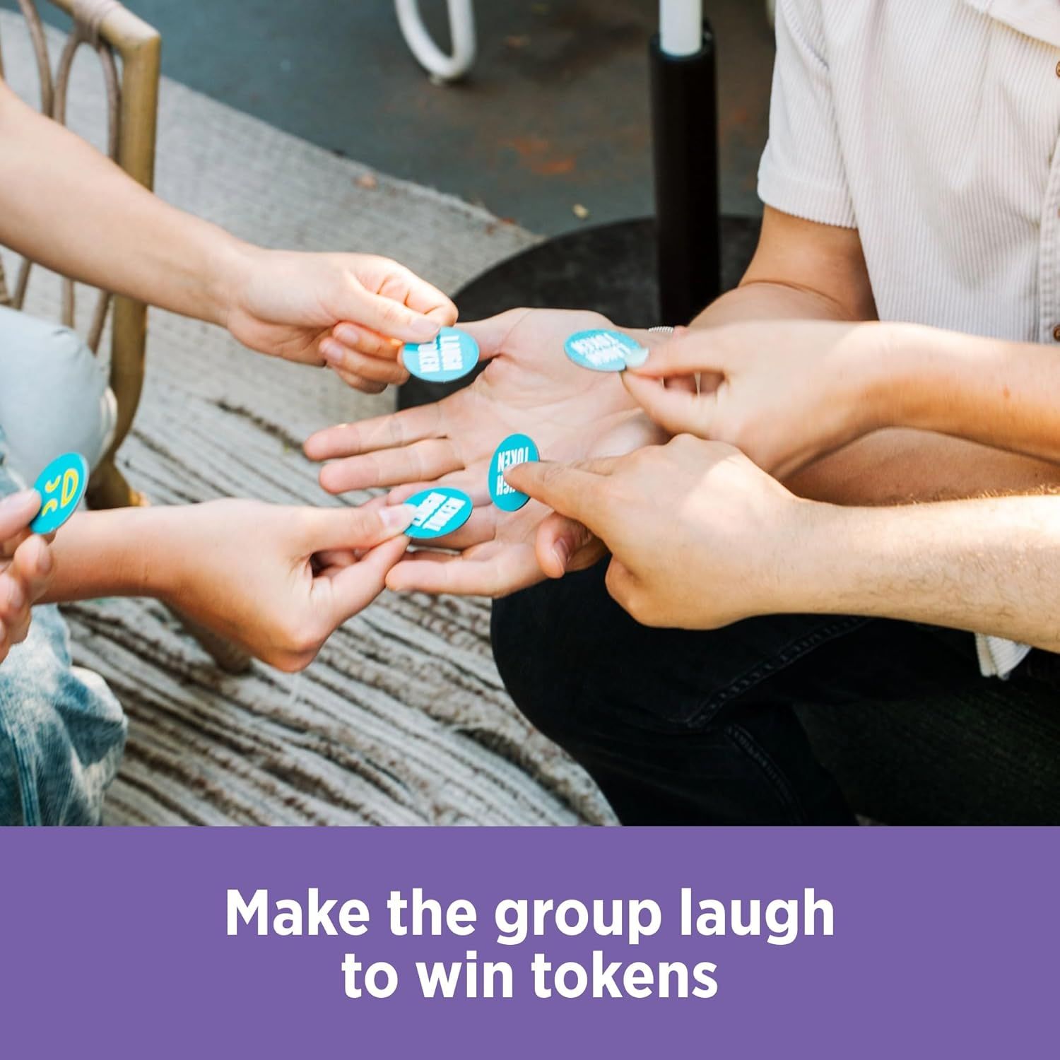 Demonstrates how to play the game by showing multiple players holding game tokens, communicating the social and interactive nature of the product to encourage group participation. Highlights the…