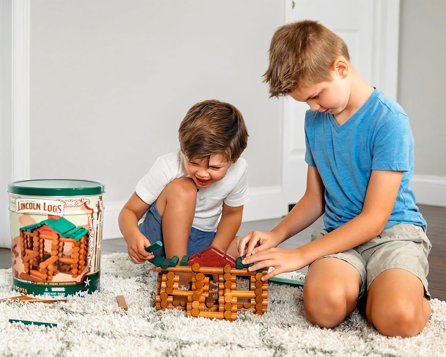 Demonstrates the product in a real-world home environment with children actively engaged in play, showing the toy's appeal and social play value.