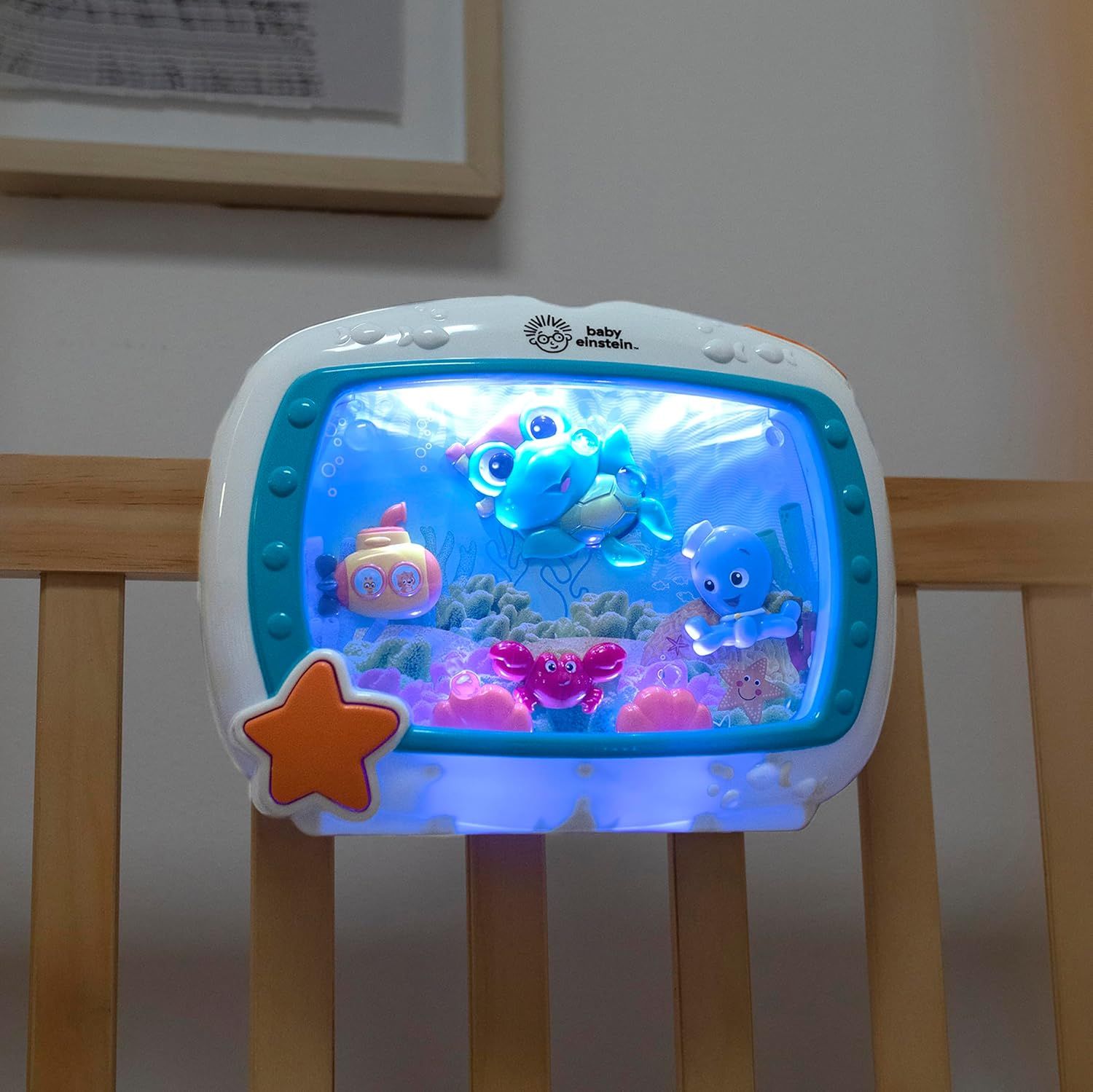 Provides a clean, catalog-style view of the Baby Einstein aquarium toy showing the product and its illuminated underwater scene display.