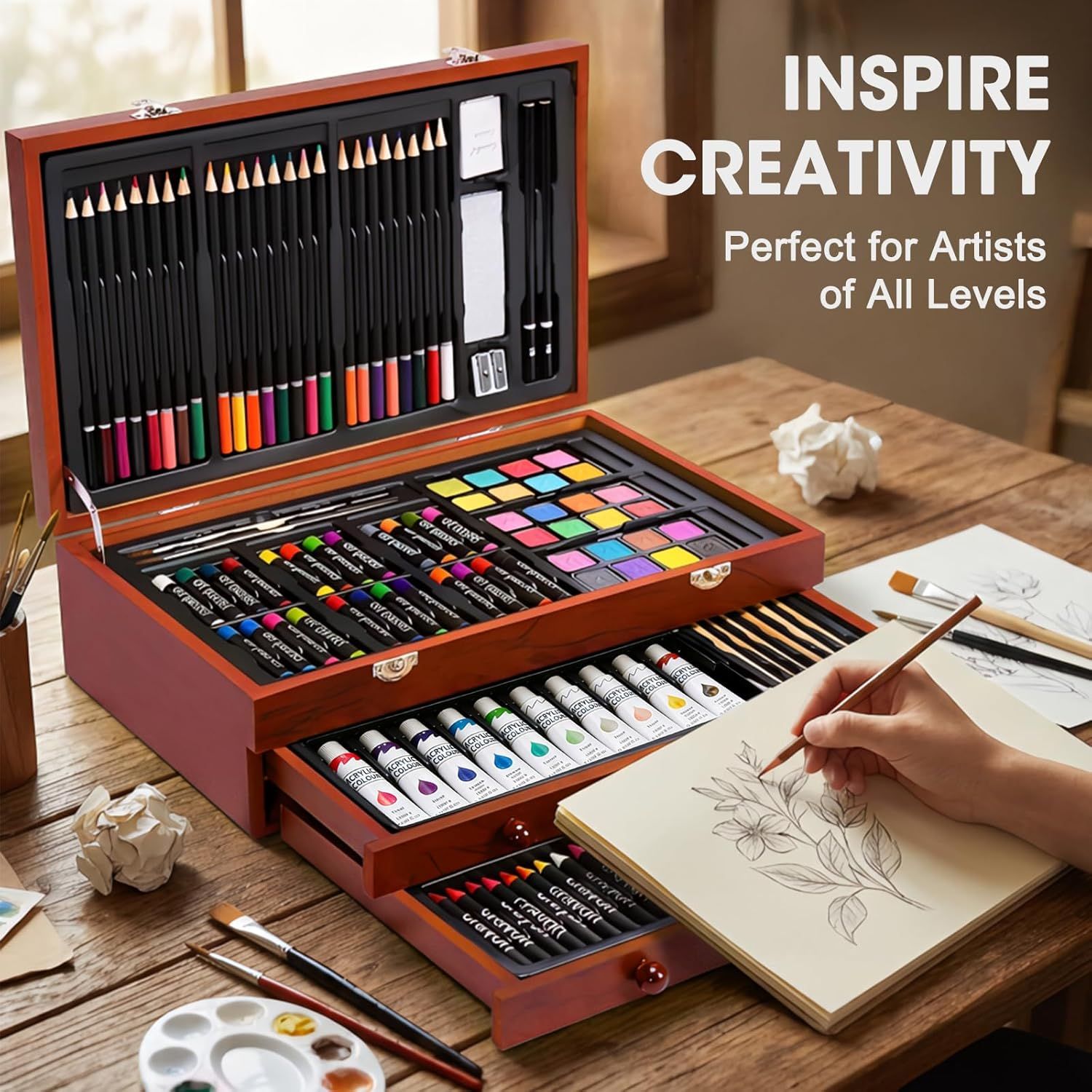 Shows the comprehensive contents of the art set including pencils, paints, markers, and accessories to demonstrate the value and completeness of the kit for artists. Communicates that this is a…
