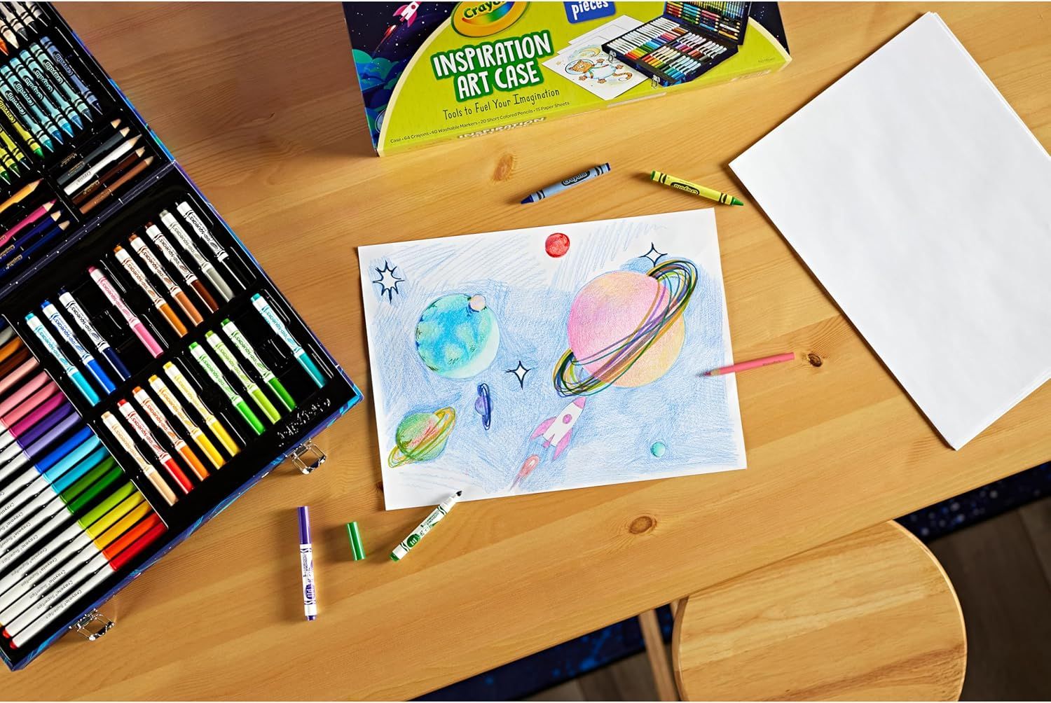 Shows everything included in the Crayola Inspiration Art Case — the full set of art supplies (markers, crayons, colored pencils) and demonstrates the product in use with a finished artwork to help…