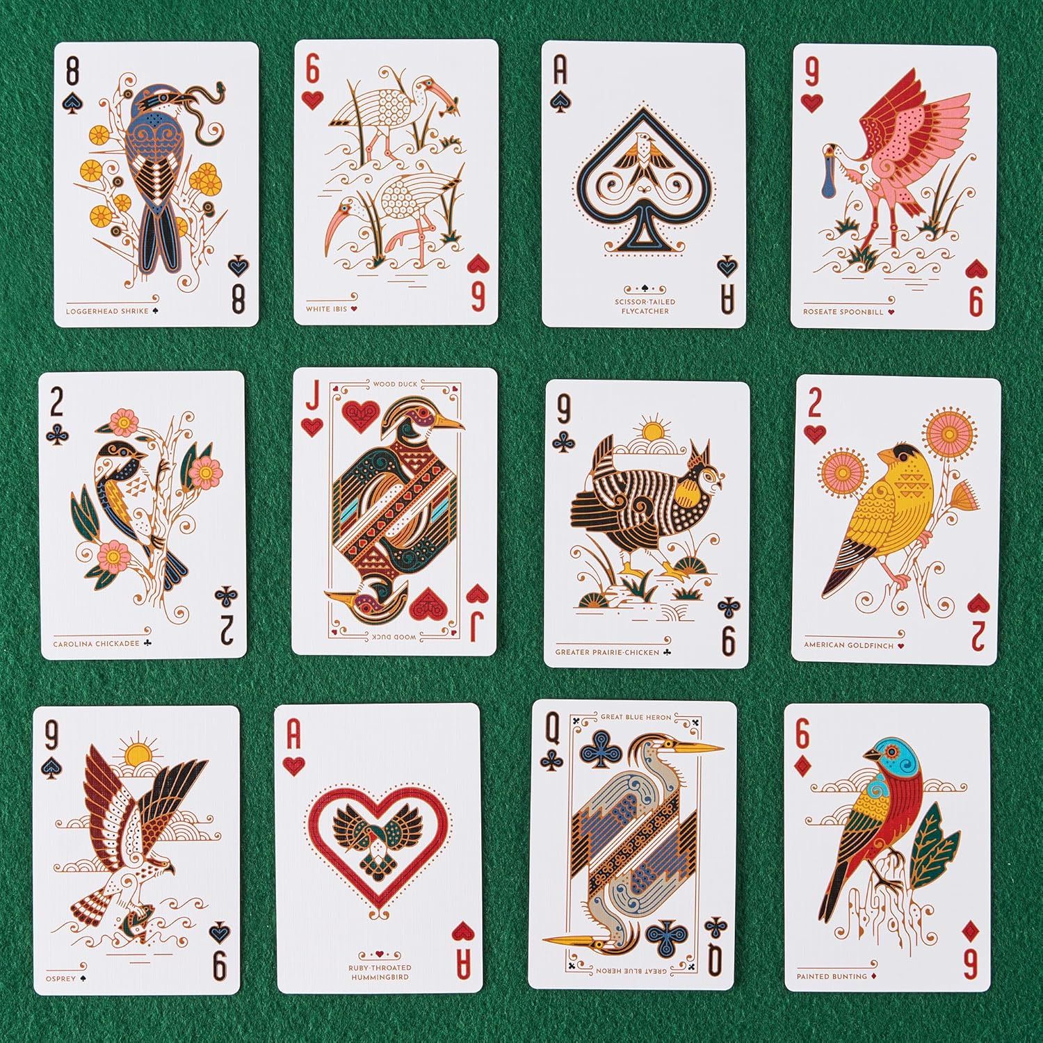 Displays the brand's complete product line of decorative bird-themed playing cards, helping shoppers understand the variety and artistic style of the full deck collection.