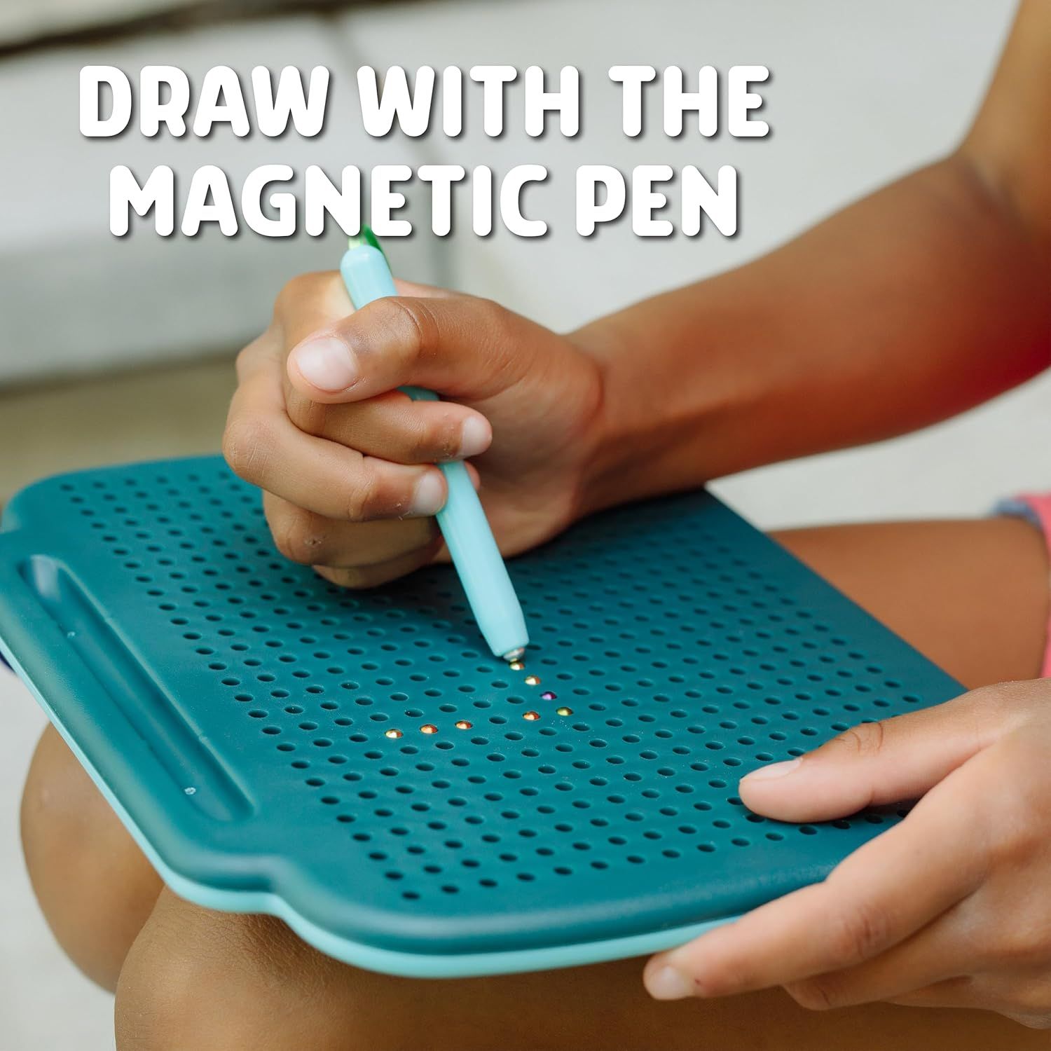 Demonstrates how to use the magnetic pen feature with the drawing board, showing the product in action to help shoppers understand the interactive functionality. Highlights the magnetic pen drawing…