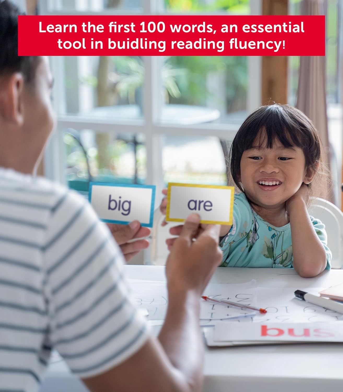Communicates that the product helps children learn the first 100 essential words to build reading fluency, reassuring parents of its educational value.