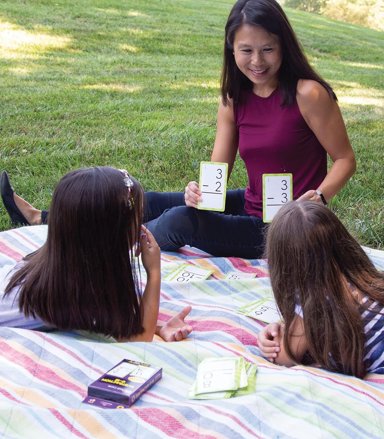 Demonstrates the product being used in a real-world outdoor setting with children, showing the product's role in family learning and engagement.