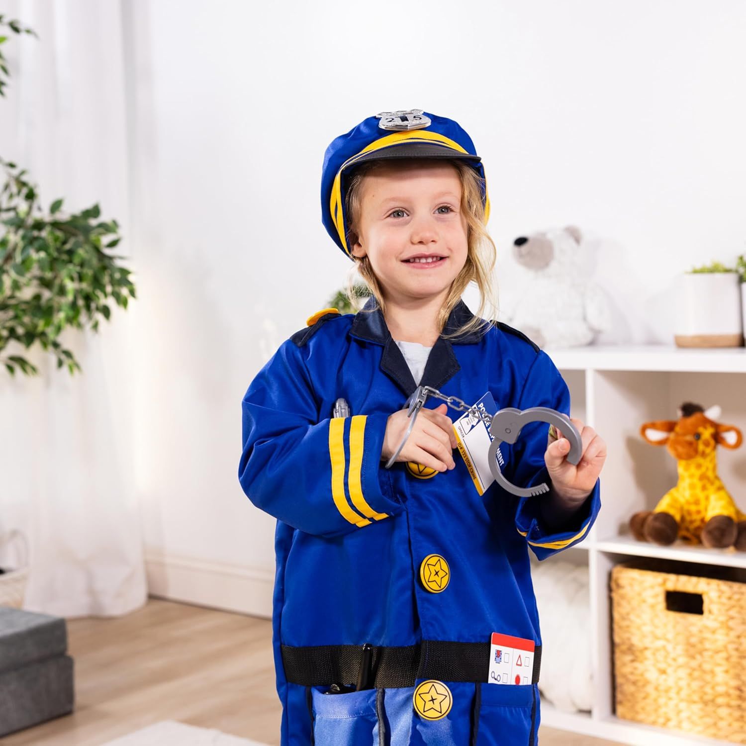 Shows the product being worn and used by a child in a real home environment to help shoppers visualize the product in action and assess fit and appeal.