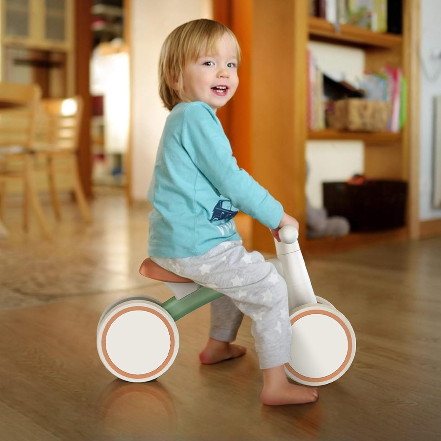 Shows the product being used naturally by a toddler in a home environment to help parents visualize how their child would use and enjoy the product.