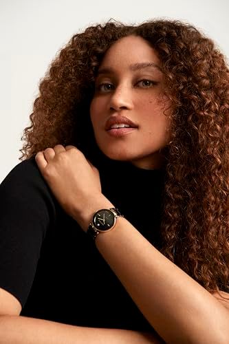 Showcases the watch worn naturally in a lifestyle setting to help shoppers visualize how the product looks when worn, emphasizing style and elegance.