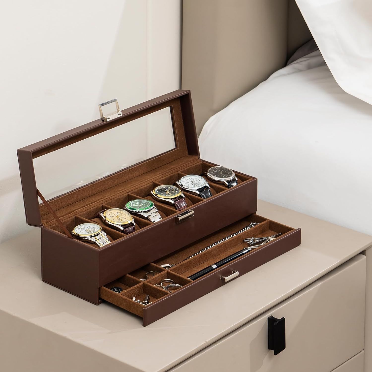 Demonstrates what the customer receives with the product—a complete storage solution with dedicated compartments for watches in the top tier and a pull-out drawer for jewelry and accessories,…
