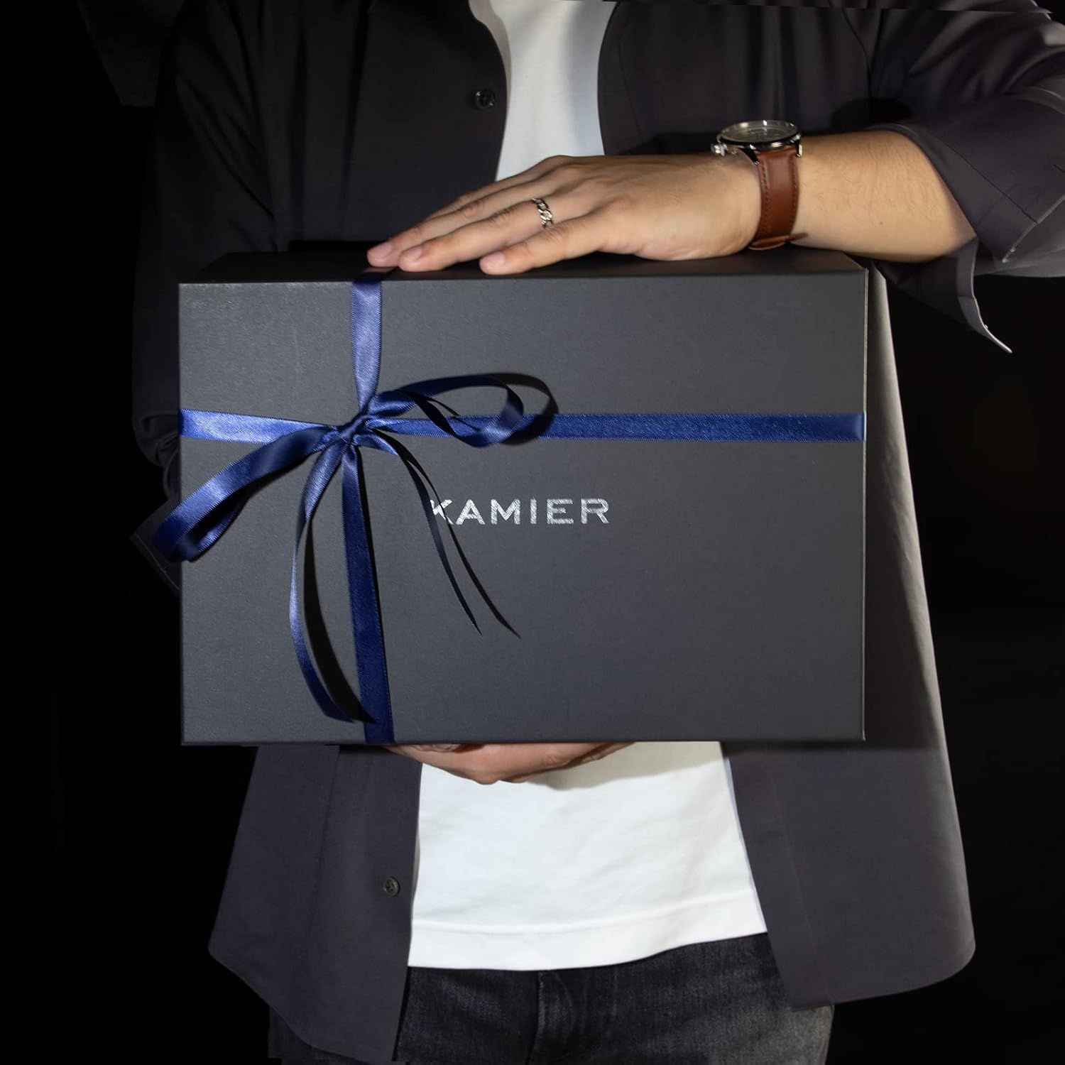 Positions the product as a premium gift option, emphasizing luxury presentation with elegant gift wrapping and ribbon to appeal to shoppers looking for special occasion or holiday gifts.