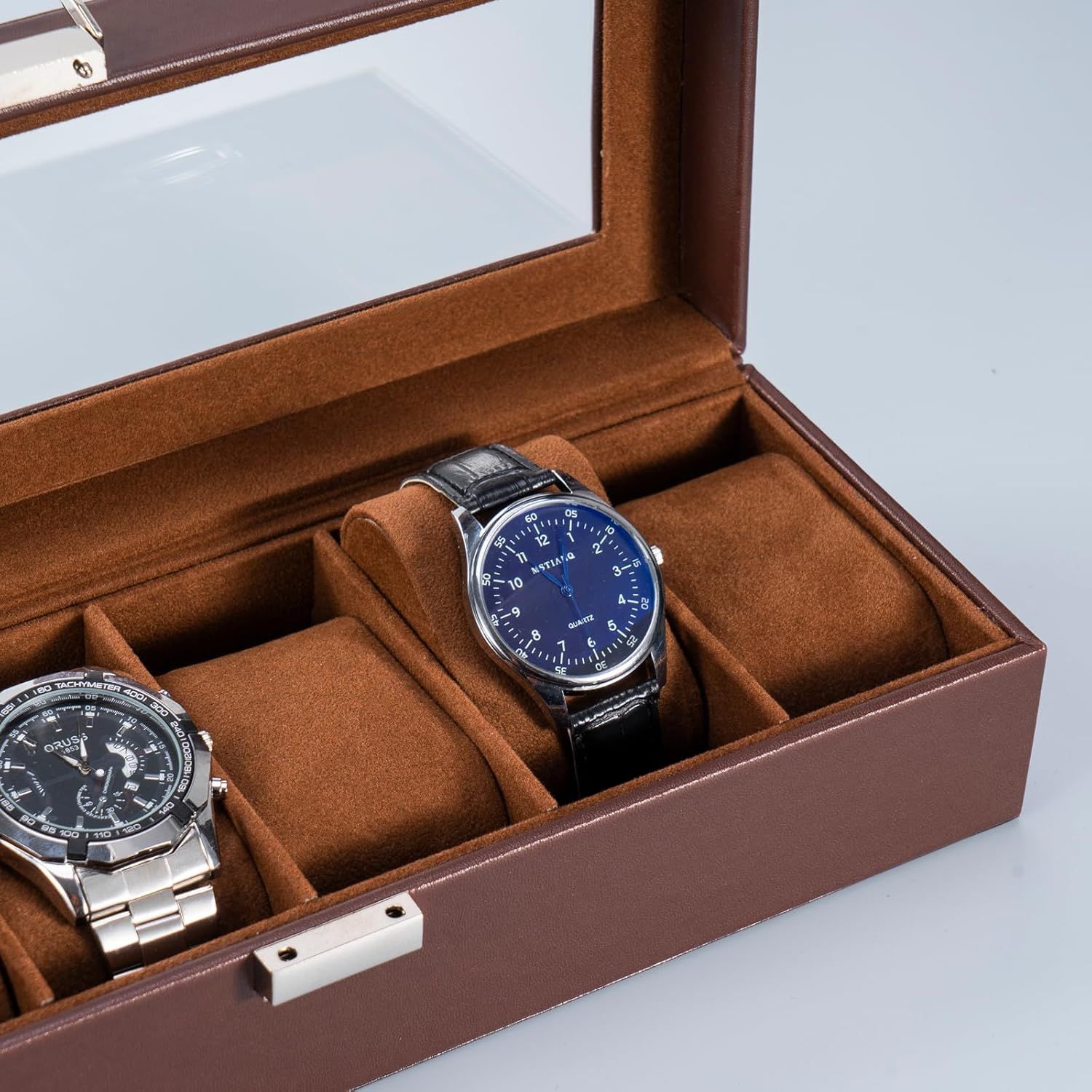 Shows the customer what is included with their purchase—a premium watch storage case with organized compartments for multiple watches and accessories, emphasizing the value and organization provided.