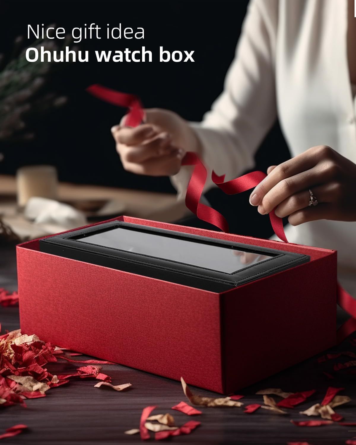 Positions the watch box as an ideal gift option, emphasizing its premium presentation with festive red ribbon and elegant packaging to appeal to shoppers looking for gift ideas. Highlights the…