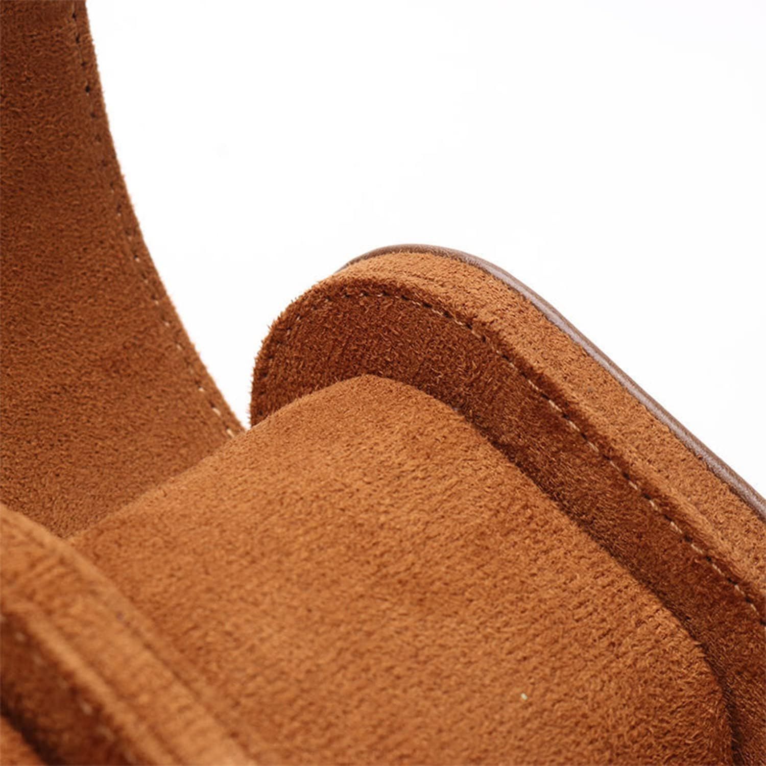 Provides a clean, detailed view of the product's suede material and stitching quality on a white background, allowing shoppers to examine the craftsmanship and texture.