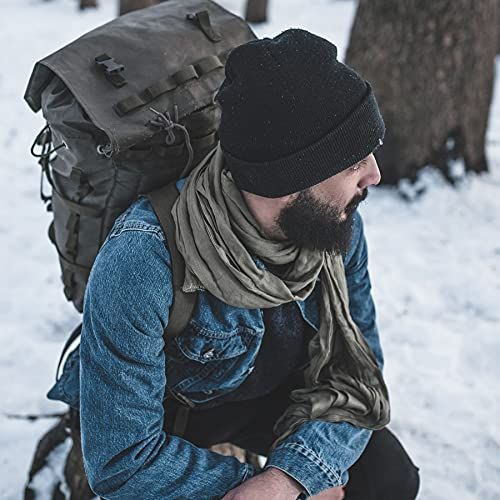Demonstrates the product in a real-world outdoor winter setting to show its practical use for hiking, camping, or outdoor adventures.