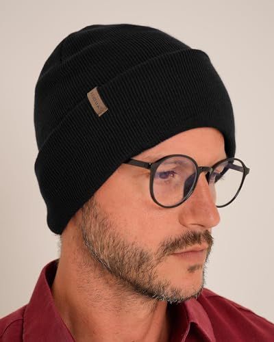 Shows the beanie worn on a model to help shoppers visualize fit, style, and how the product looks when worn.