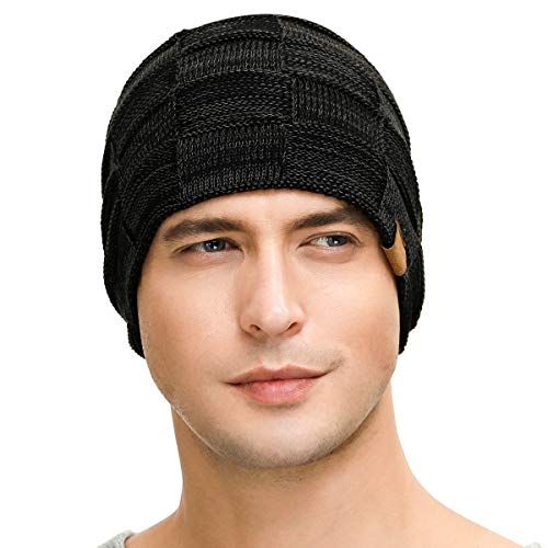 Shows the beanie worn on a model to help shoppers visualize fit, style, and appearance when worn.