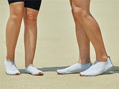 Demonstrates the product being worn in a natural outdoor setting to help shoppers visualize the shoes in everyday use.