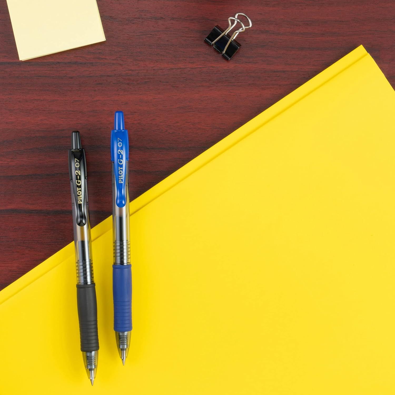 Shows the product in a real-world office or school context to help shoppers visualize the pens in everyday use.