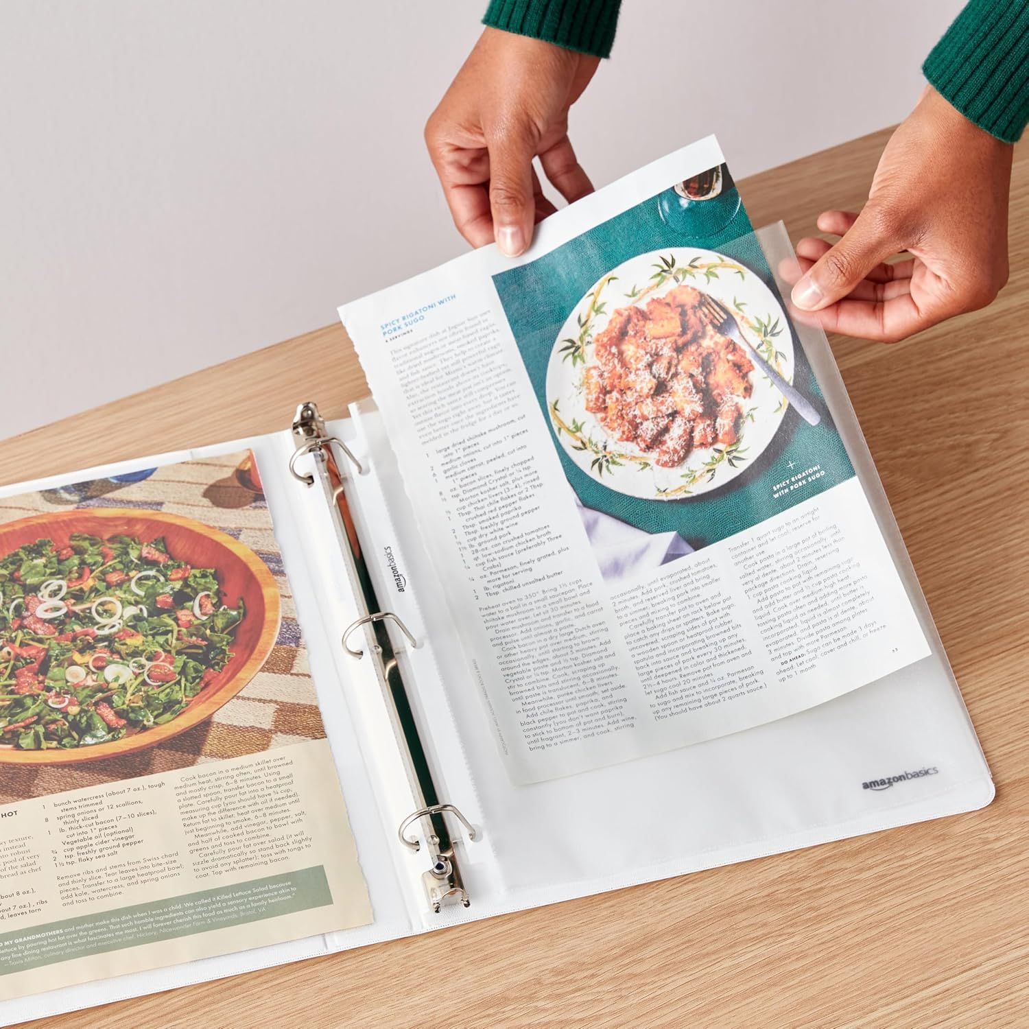 Demonstrates the product in use as a recipe organizer in a real-world kitchen setting, showing how it can be used to store and display recipe pages.