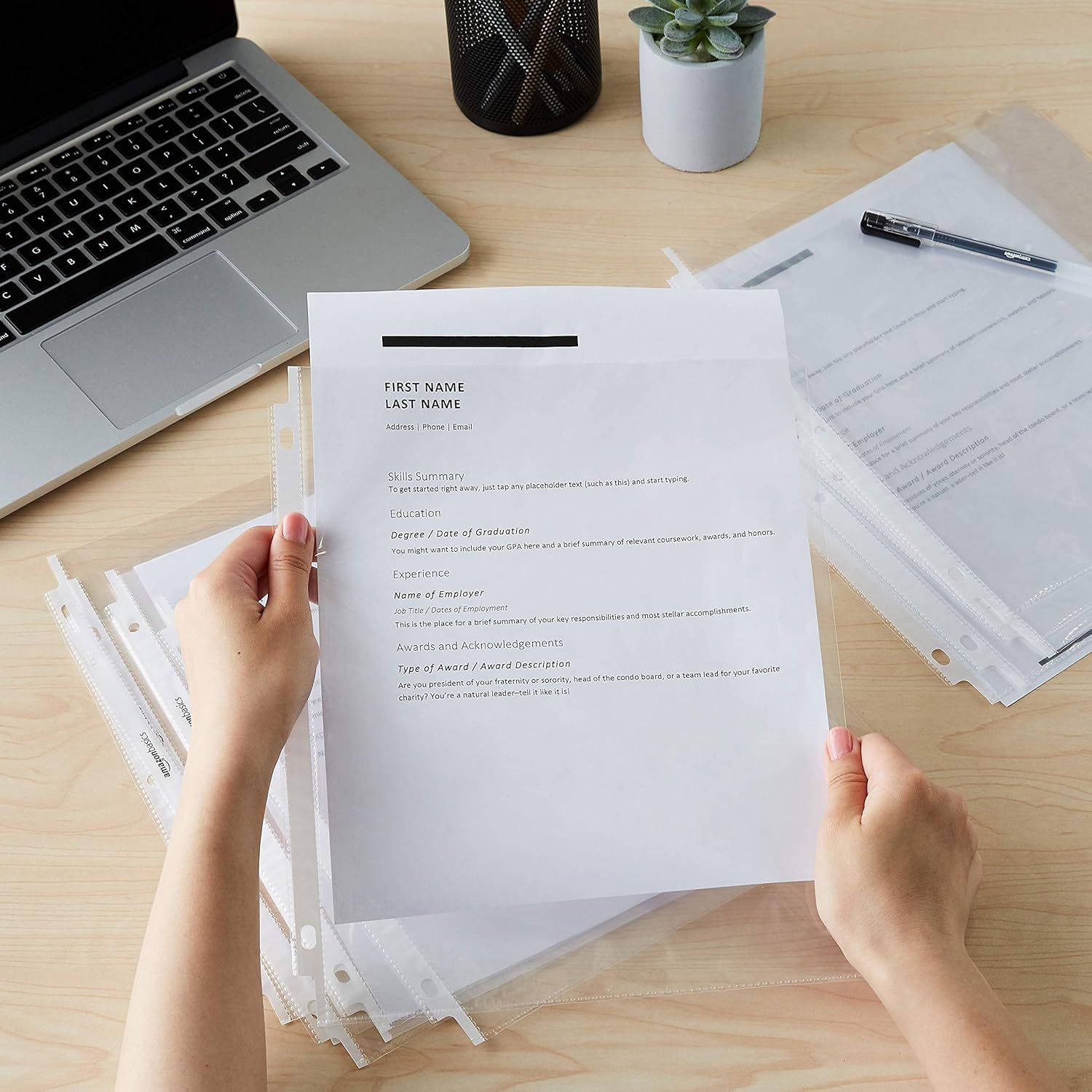 Demonstrates the product in a real-world professional office setting, showing how the document holder or resume paper is used in everyday work contexts.