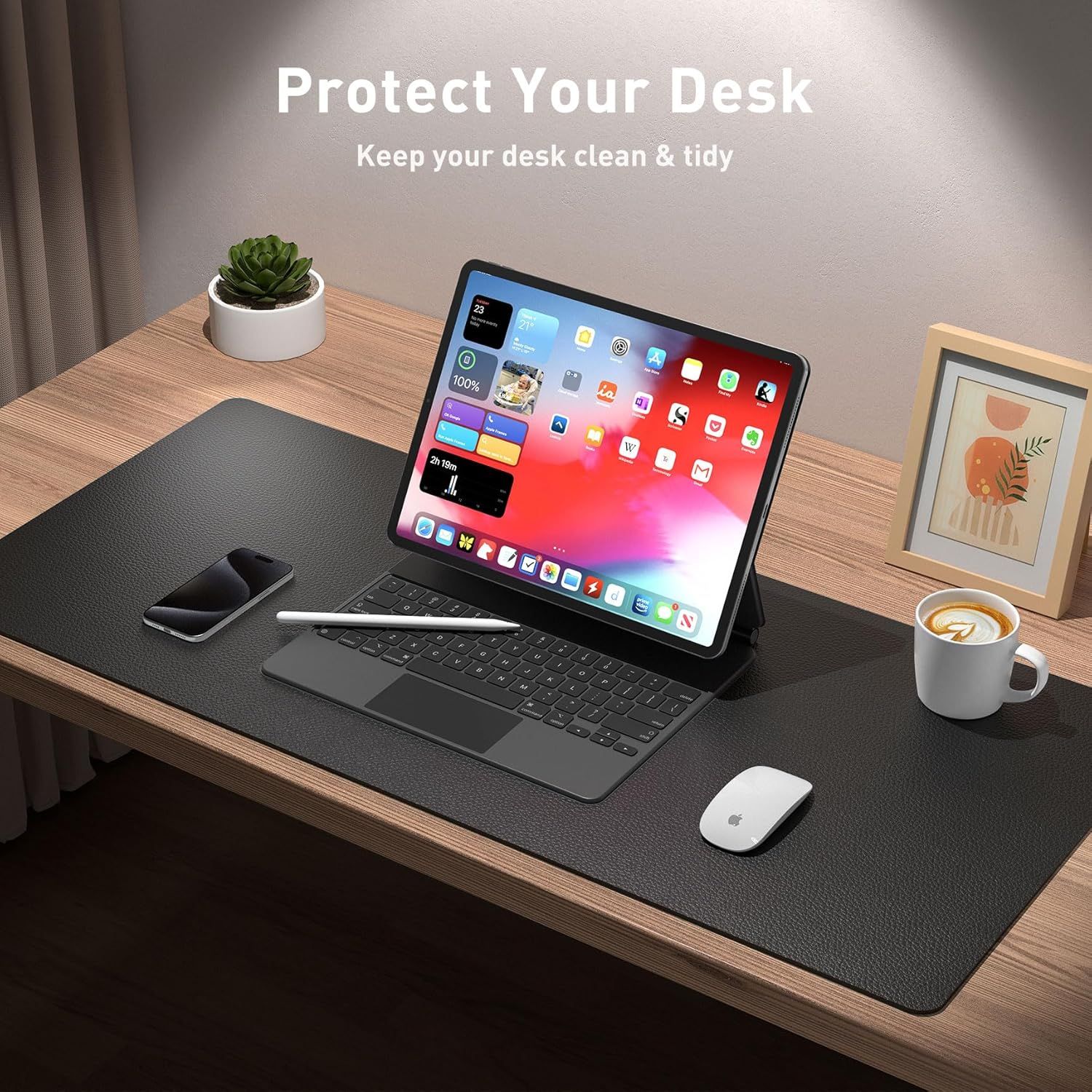 Communicates that the desk mat protects the desk surface while keeping the workspace clean and organized, appealing to shoppers looking for functional desk accessories.