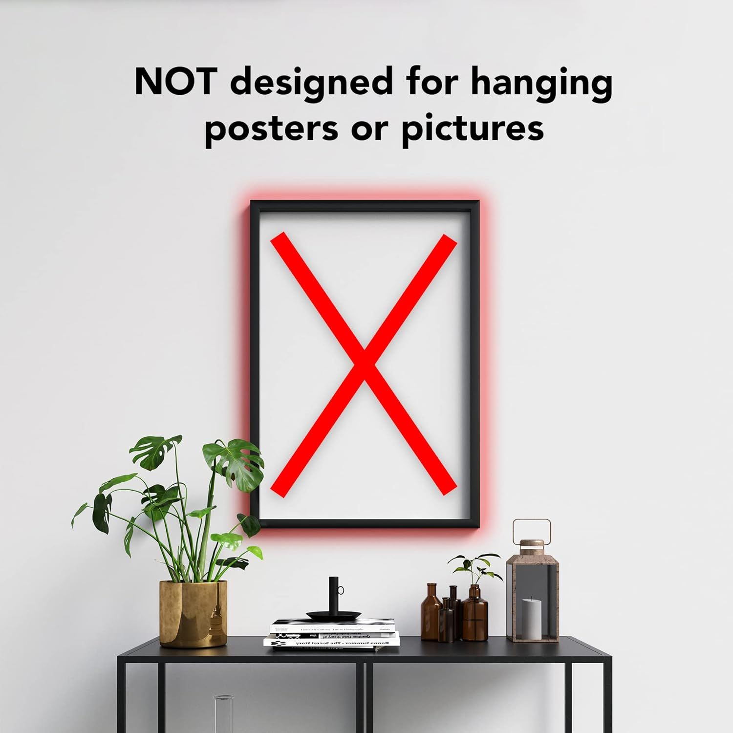 Clarifies that the product (likely a frame or shelf) is not designed for hanging posters or pictures, preventing misuse and setting proper expectations for shoppers.