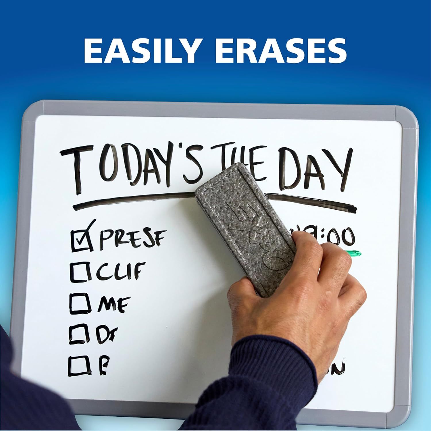 Demonstrates that the whiteboard eraser effectively removes marker writing, reassuring shoppers of the products cleaning performance and ease of use.