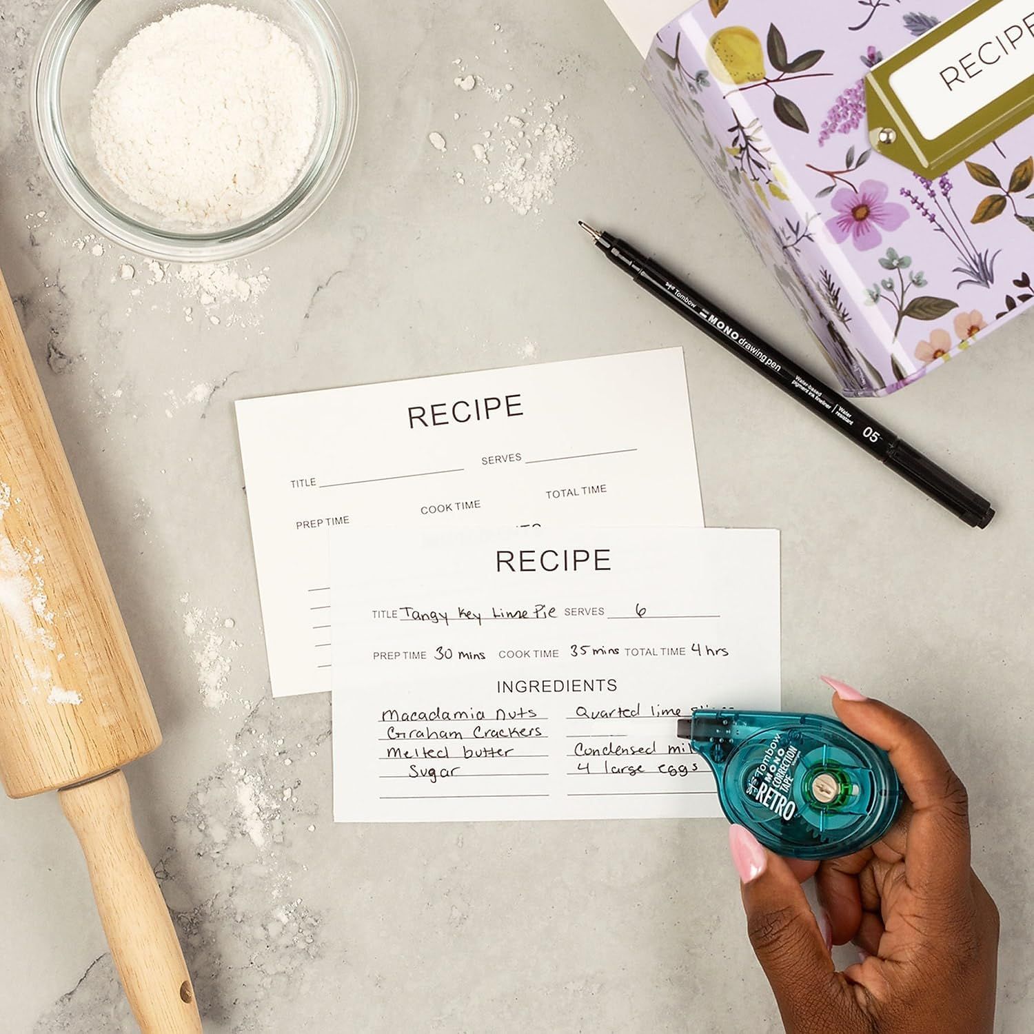 Shows all the items included with the product to help shoppers understand what they will receive in the package, emphasizing the complete recipe card kit with writing tools.