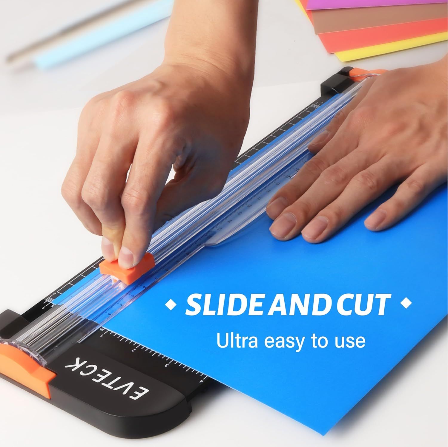 Demonstrates how to use the paper trimmer by showing the simple slide-and-cut action, reassuring shoppers that the product is ultra easy to use. Highlights the primary benefit of effortless…