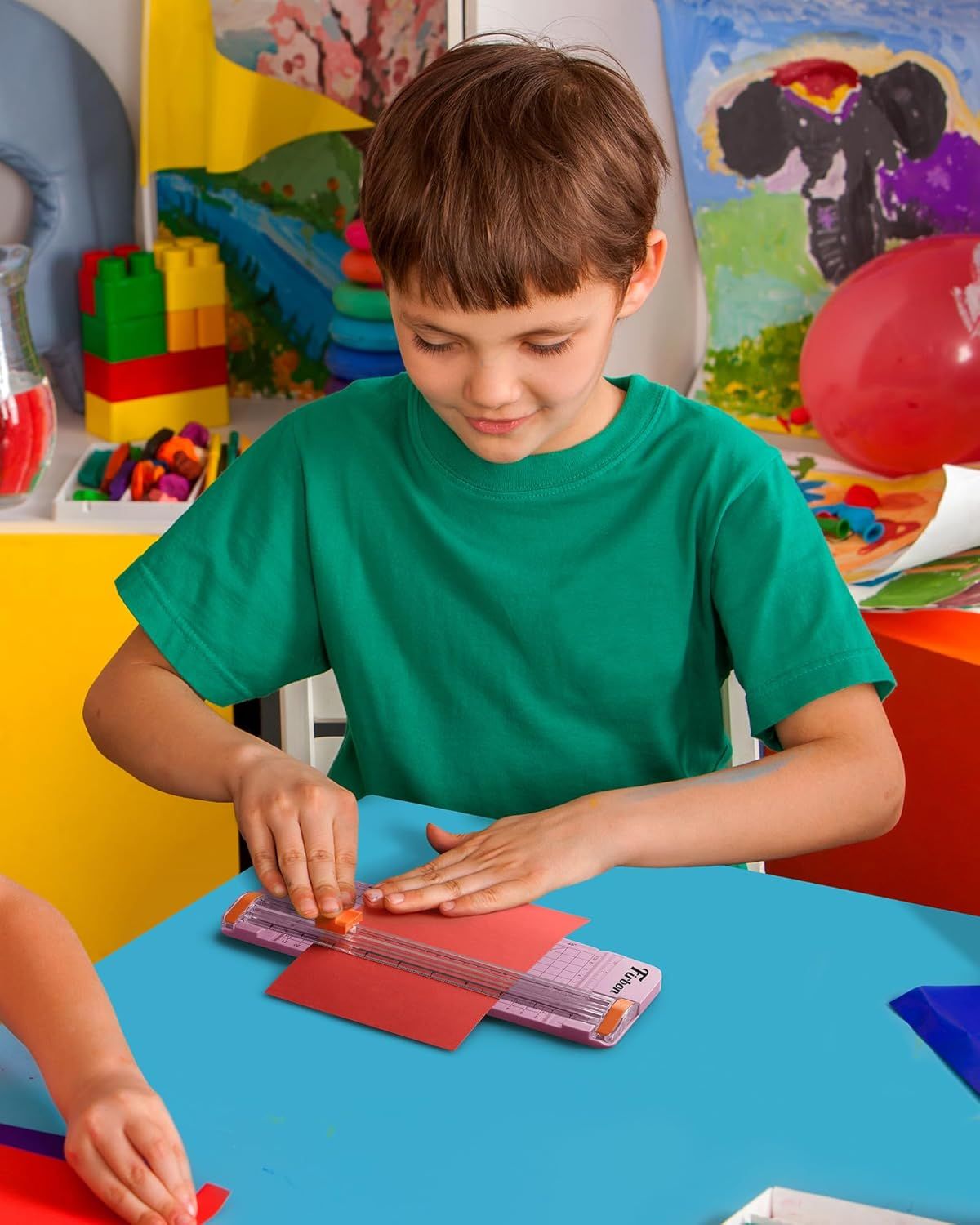 Demonstrates the product in a real-world context showing a child engaged in arts and crafts, helping shoppers visualize how the product fits into everyday creative activities.