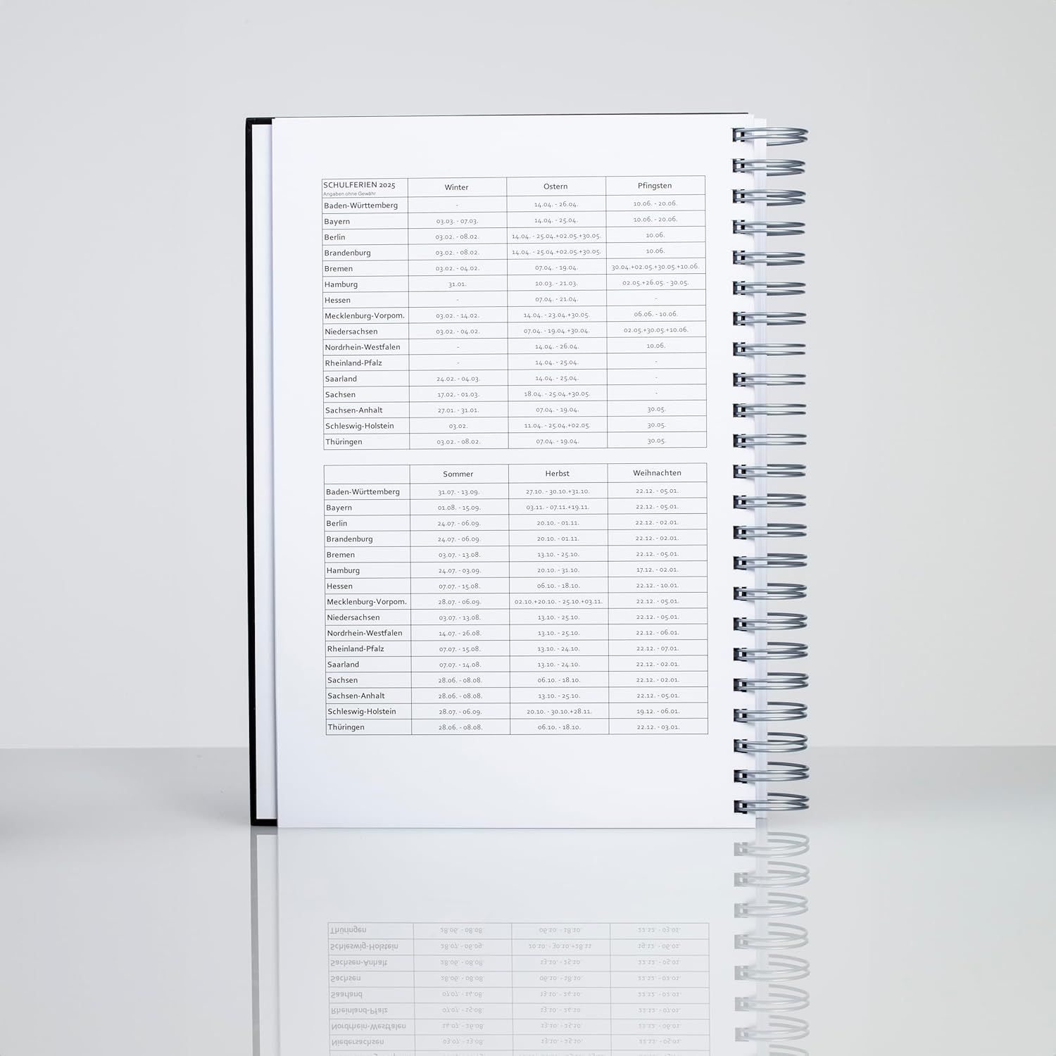 Provides a clean, catalog-style view of the spiral-bound notebook/planner showing the product's physical appearance and binding style without distractions.