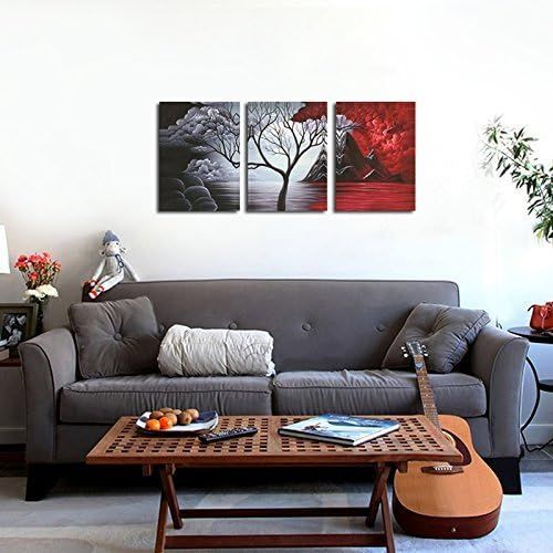 Demonstrates how the wall art looks when displayed in a real living room setting above a sofa to help shoppers visualize the product in their own home.