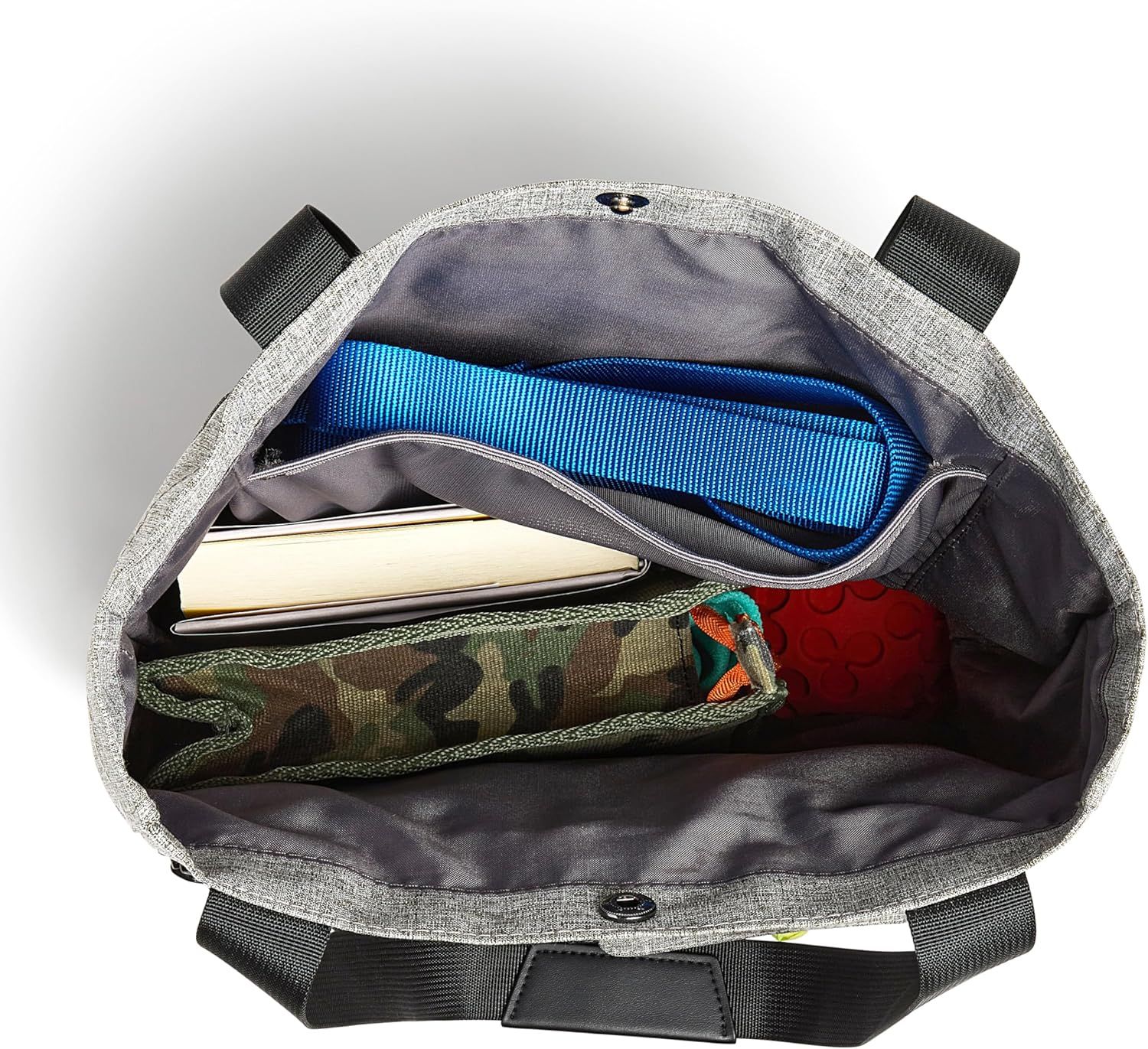 Displays the interior contents and organizational features of the tote to demonstrate storage capacity and what can be carried inside.