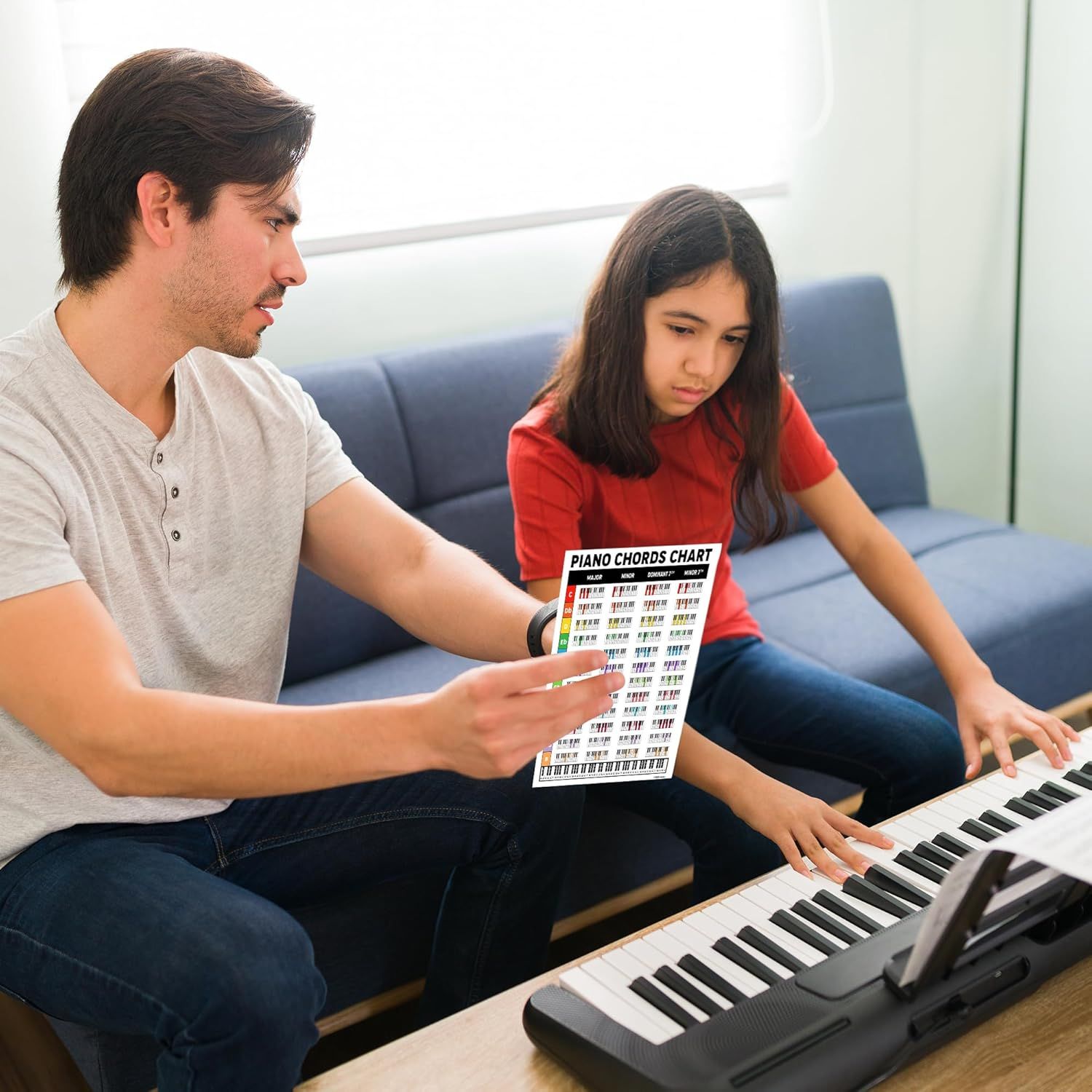 Shows the product being used in a real teaching and learning context to help shoppers visualize how it fits into piano instruction.