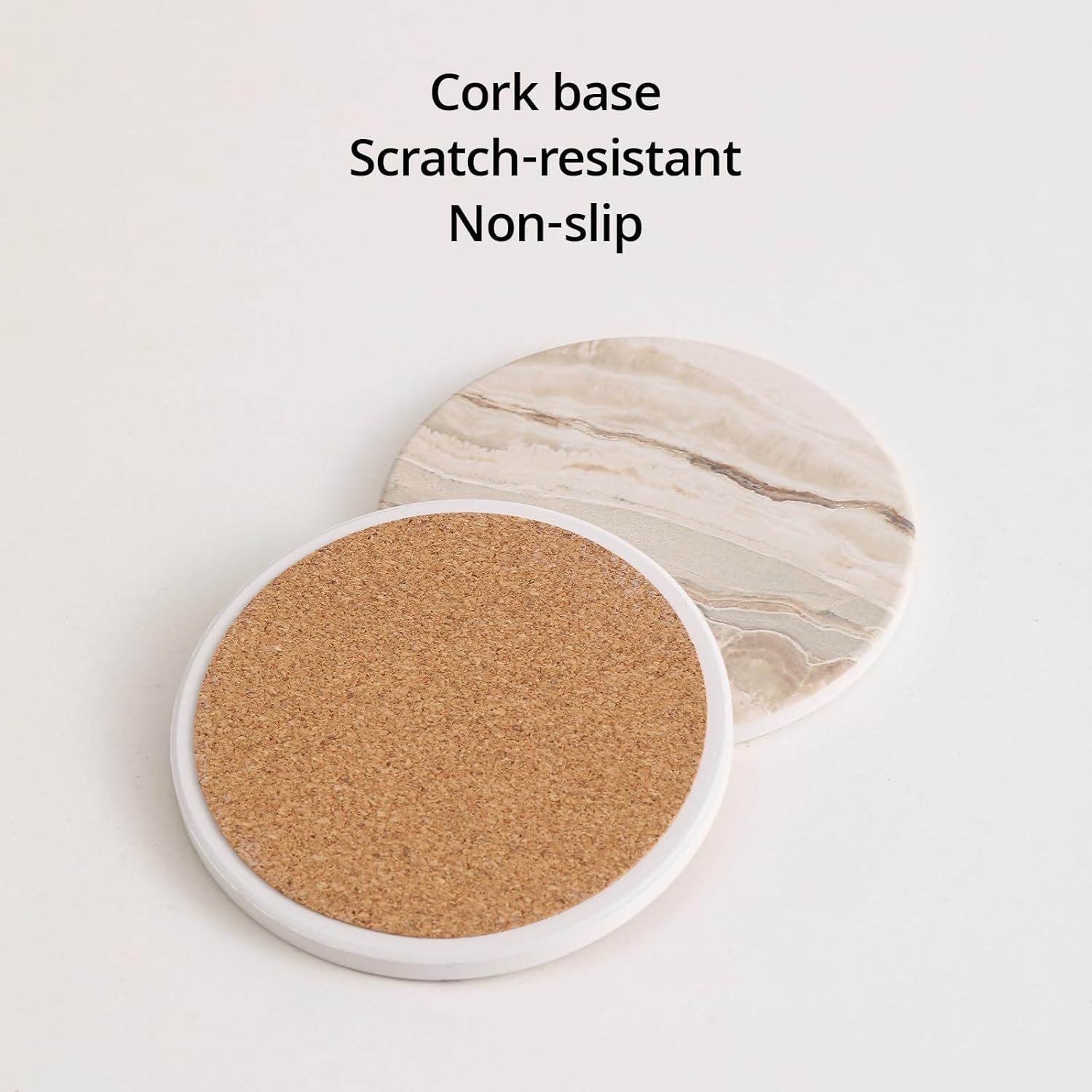 Highlights the physical construction and material features of the coaster base to communicate protective functionality. Communicates the protective benefits of the cork base material in a simple,…