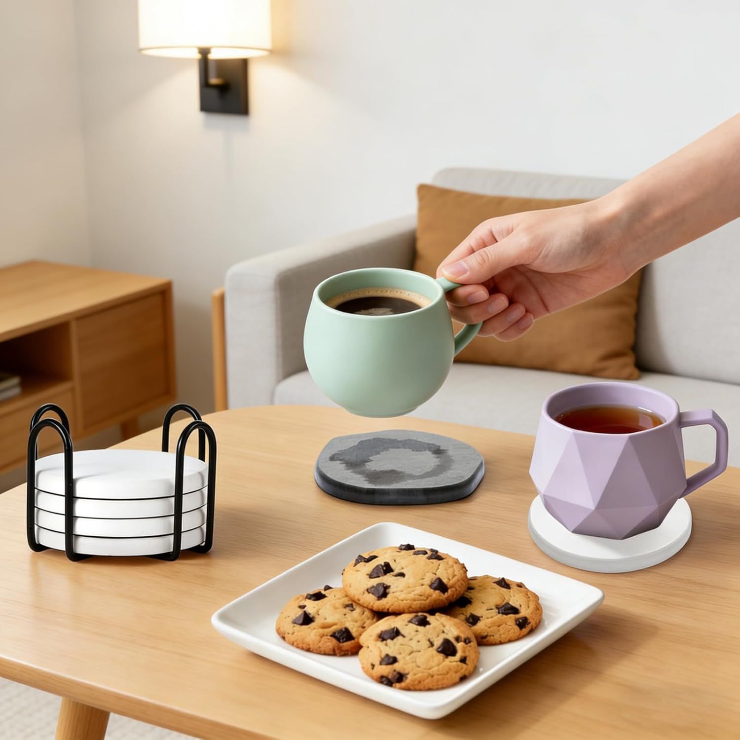 Shows the coasters in a real-world home setting with beverages and snacks, helping shoppers visualize the product in everyday use.